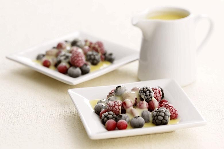 Iced berries with white chocolate sauce